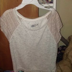 Lace short sleeve shirt.